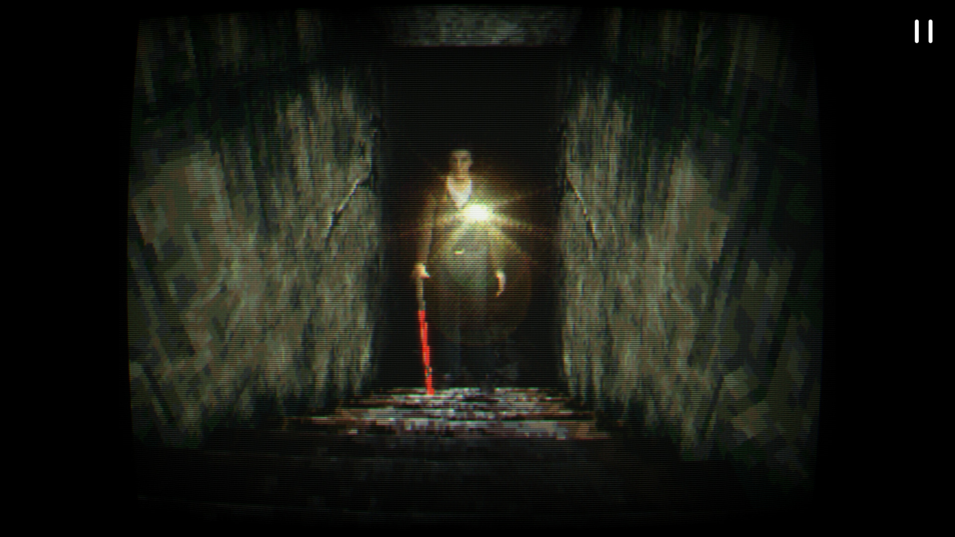 A screenshot from Silent Hill for the PlayStation. Harry, the protagonist, is standing at the bottom of a dingy staircase, his pocket flashlight creating a lens flare.