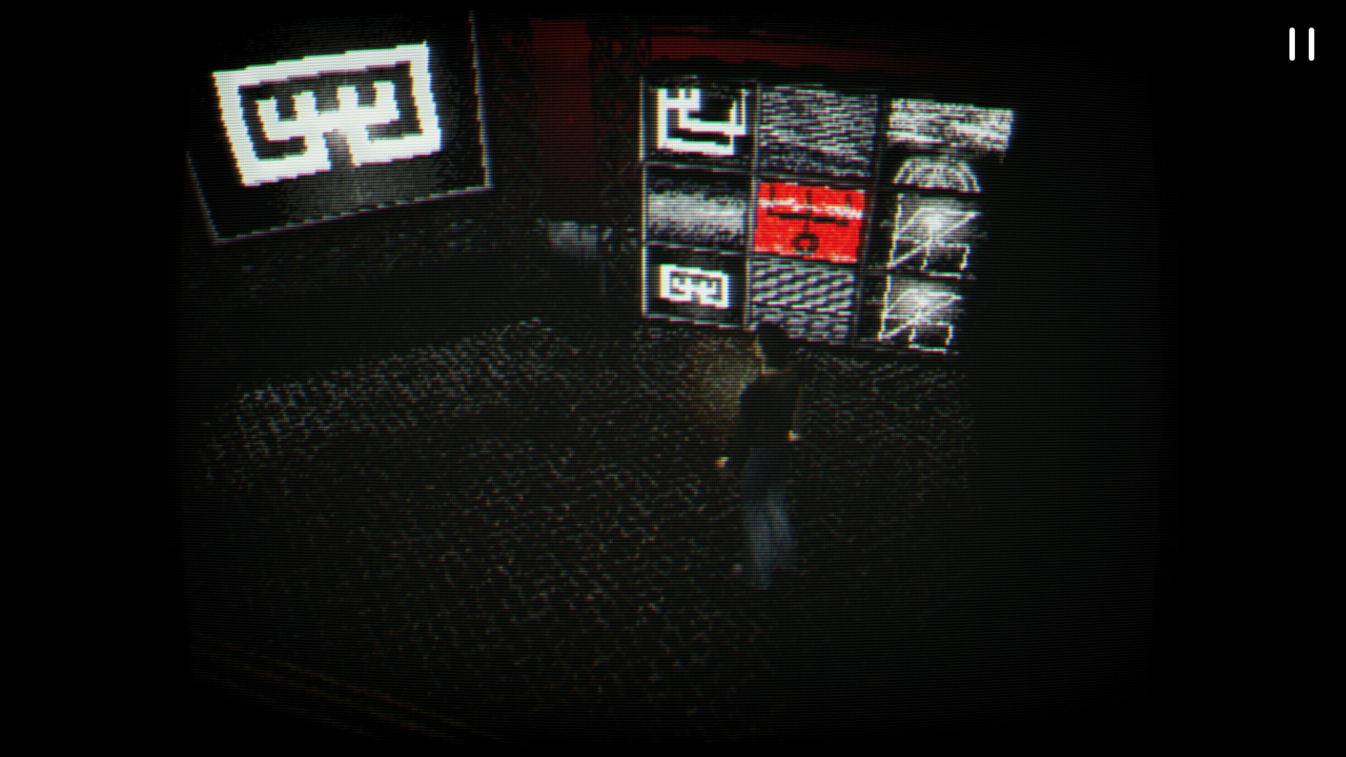 A screenshot from Silent hill for the PlayStation. Harry stares at an array of large-screen televisions in an abandoned shopping mall. The televisions are displaying eerie arcane sigils.